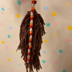 Brown yarn therian tail